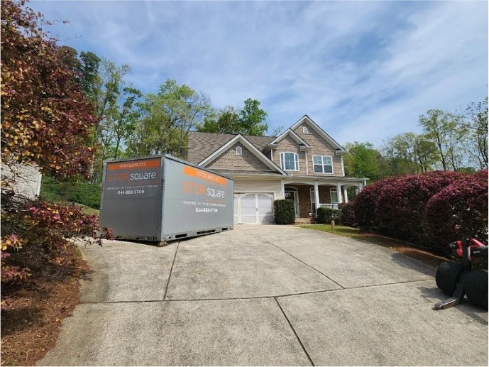 STORsquare portable storage container placed in a residential driveway for customers in East Spencer, NC.