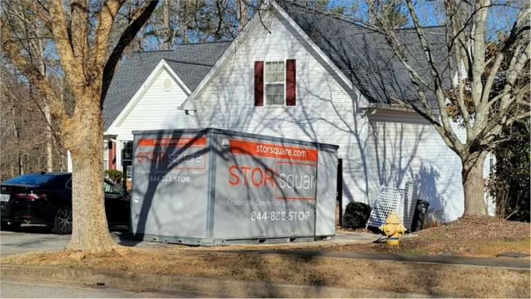 STORsquare storage container rental placed beside a residential home in Alturas, FL.