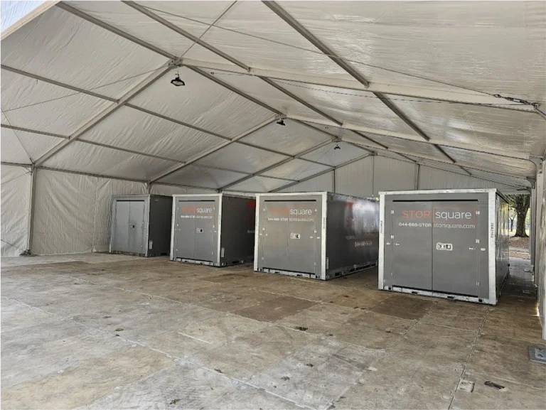 Multiple STORsquare portable storage containers kept under covered storage for customers in Watkinsville, GA.